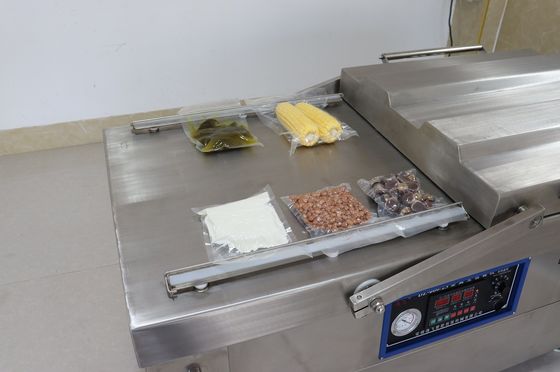 Macchina di confezionamento a vuoto a doppia camera per frutti di mare carne salata pesce secco carne suina carne bovina e riso
