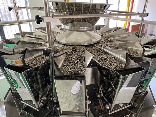 Materiale di imballaggio in plastica usato Macchina di imballaggio a sacchetto rotativo a velocità ridotta per noci e semi