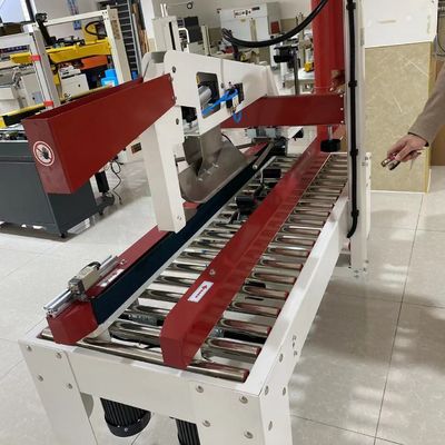 Massimizza la produttività con la nostra macchina di sigillamento del cartone