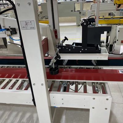 Massimizza la produttività con la nostra macchina di sigillamento del cartone