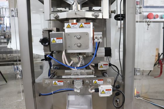 Macchina di imballaggio di noci da 350 kg con sacchetto di sigillamento a tre lati della tazza di misura e modulo di sigillamento termico