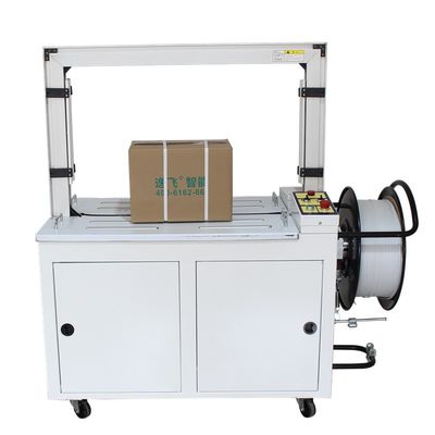 Capacità di incollaggio 150 KG MH101 Low Table Packer Strapping Machine Con Conveyor Line