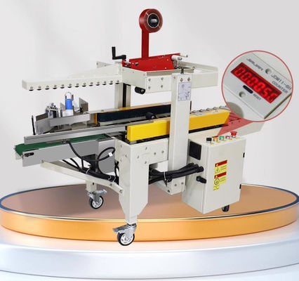 Macchina di sigillamento del cartone per l'imballaggio a azionamento sinistro e destro Applicare altezza del cartone 90-420 mm