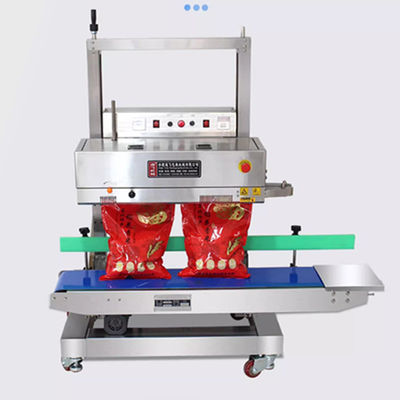 Convogliare carico 20 kg sigillante automatico continuo a banda verticale per sacchetti in piedi