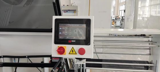 Macchina avvolgitrice sigillatrice a L in plastica con larghezza massima del film di 55 cm per imballaggi con involucro termoretraibile