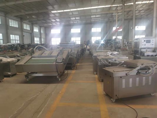 Macchina di imballaggio a vuoto a rotolo a fascia continua per gamberetti secchi e salmone affumicato